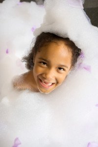 Girl in bubble bath, foam 
